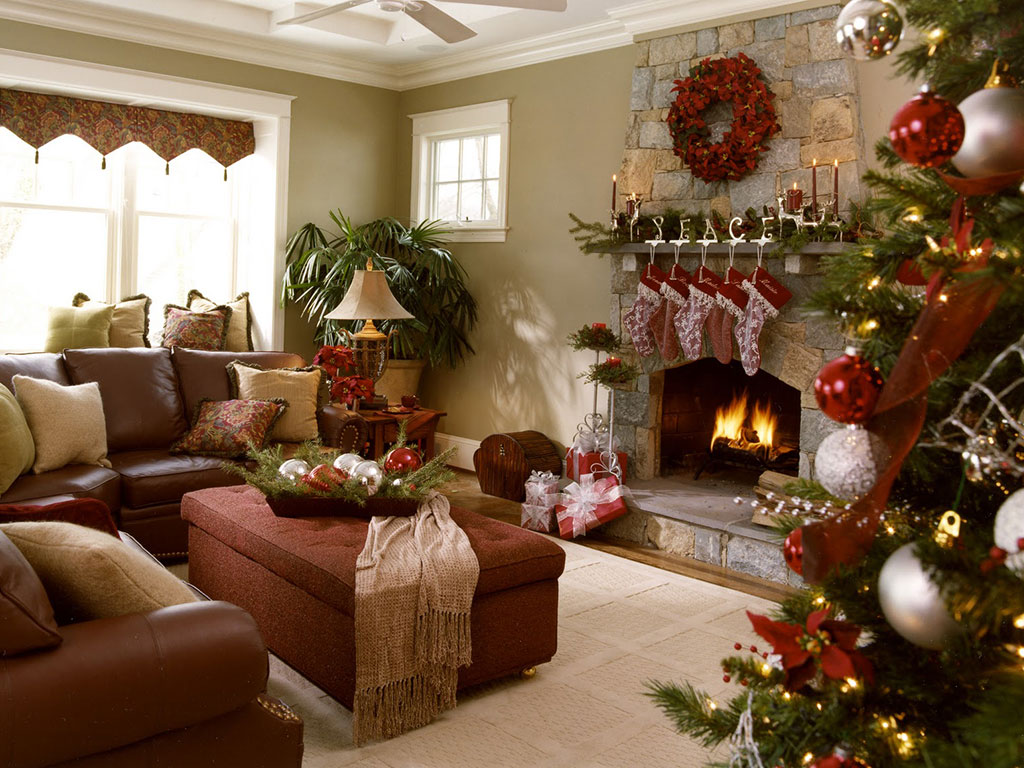 Traditional Christmas Mantel Decorations placed on a stone fireplace