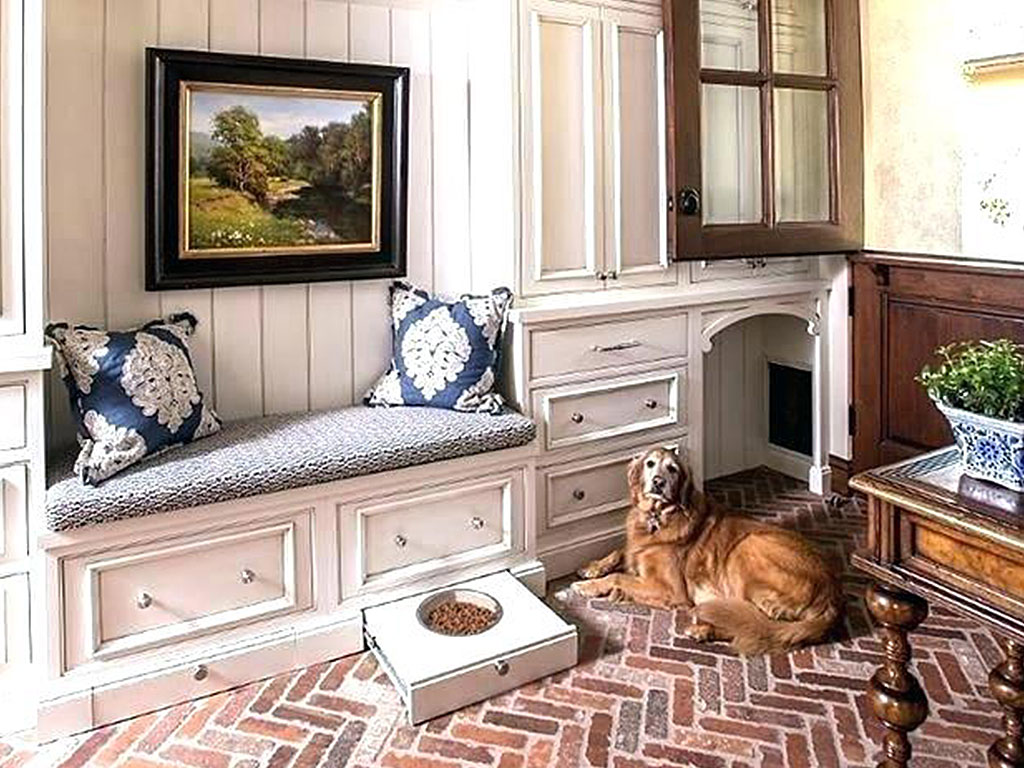 Mudroom with custom cabinetry designed for pets